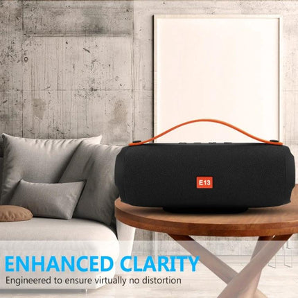 Compact Bluetooth Travel Speaker For Home, Desk, And Workouts black portable speaker on table for desk and small gatherings
