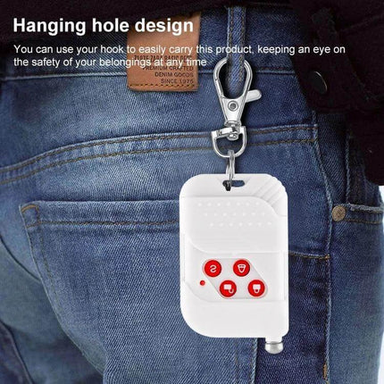 Wireless Keychain Remote for Home Security Alarm Systems - white 4-button key fob with hanging hole clipped to jeans pocket