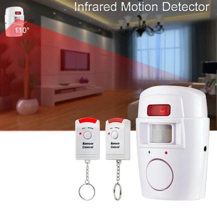 Wireless Infrared Motion Sensor Alarm for Home Security white motion detector with two remote controls in living room scene
