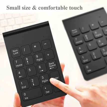 Wireless Mini Numeric Keypad in Black for Laptops - compact wireless numeric keypad held in hand for fast spreadsheet data entry