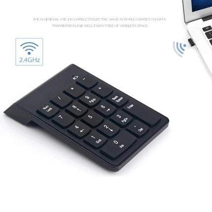 Wireless Mini Numeric Keypad in Black for Laptops shown wirelessly connected to a laptop for fast numeric data entry
