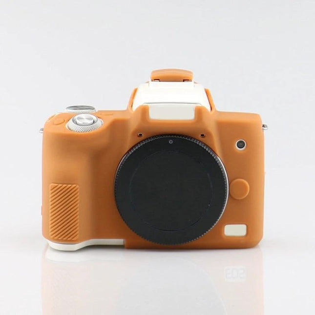 Richwell Silicone Protective Case for Canon EOS M50 Camera in orange silicone showing front view with lens cap on and access to controls