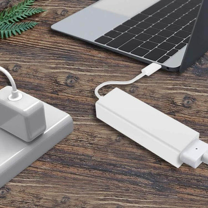 USB C to Mag-Safe Charging Adapter for MacBooks and Phones connected between MagSafe charger and MacBook for safe magnetic breakaway charging