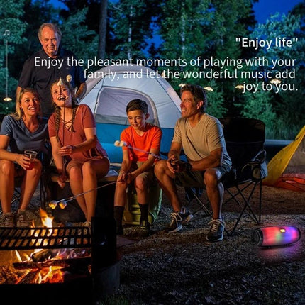 Compact T G Portable Bluetooth Speaker For Home And Outdoor Use camping scene with family around a bonfire and LED speaker lights