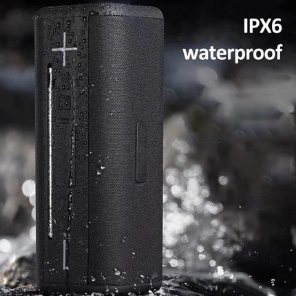Portable Bluetooth Speaker For Home And Travel With Compact Design shown with water droplets, IPX6 rated