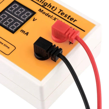 Portable Handheld LED Tester for TV Backlight and Strip Testing - close-up of tester with red and black connectors and LED display