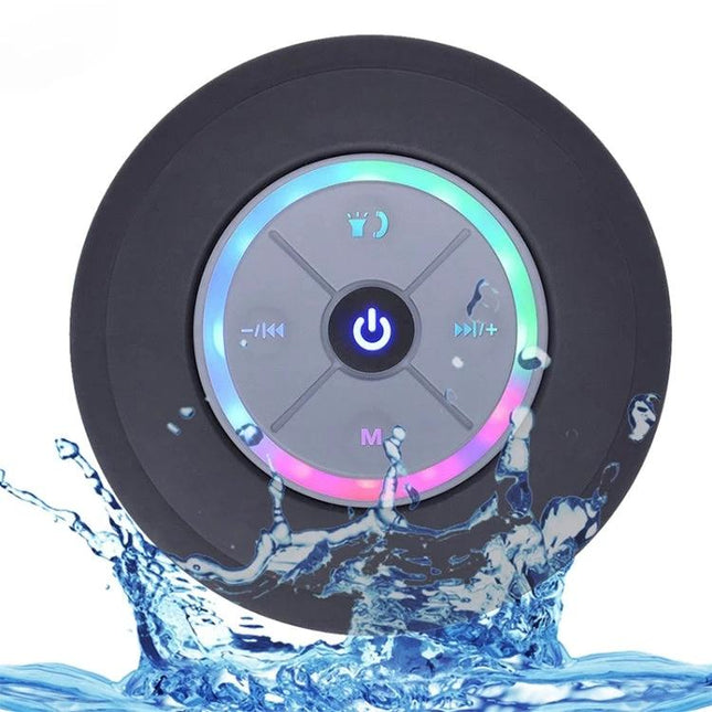 Compact Waterproof Shower And Beach Speaker With Suction Cup showing LED ring, splashproof use in shower or poolside, hands-free placement