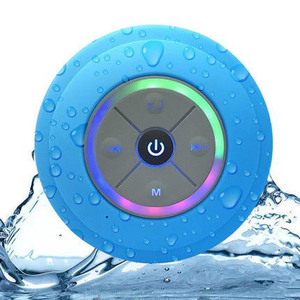 Compact Waterproof Shower And Beach Speaker With Suction Cup showing blue speaker with LED ring and water droplets