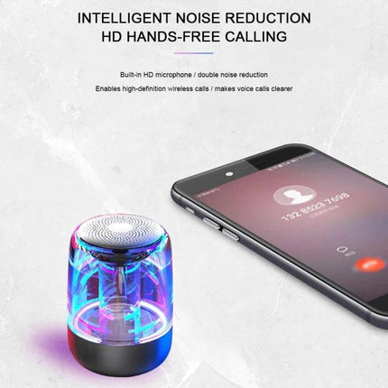 Portable Bluetooth Speaker With Ambient LED Light For Home showing transparent LED speaker beside smartphone during hands-free call