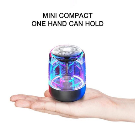 Portable Bluetooth Speaker With Ambient LED Light For Home shown compact on one hand with colorful transparent acrylic lighting