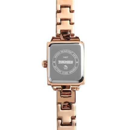 SKMEI Rose Gold Women's Elegant Fashion Watch for Daily Wear - slim rose gold square case and bracelet, quartz movement for everyday comfort