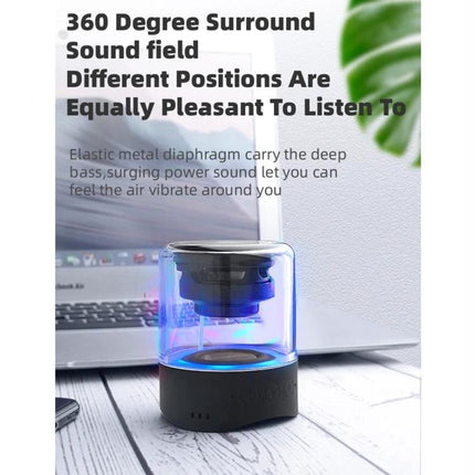 Fineblue Bluetooth Speaker For Home Use Compact Portable Design sleek translucent mini speaker with blue LED on a desk