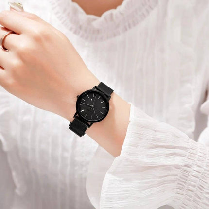 SKMEI Elegant Simple Business Wristwatch for Women Daily Use - black minimalist round dial, calendar, quartz movement, 30m water resistant on wrist