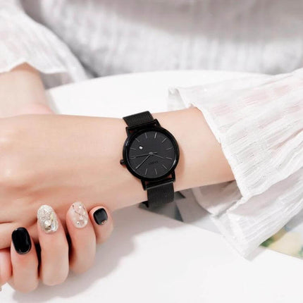 SKMEI Elegant Simple Business Wristwatch for Women Daily Use black minimalist round dial on wrist, mesh strap, calendar, quartz, 30m waterproof