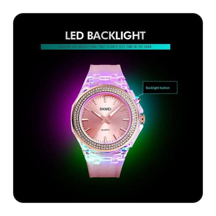 SKMEI Women's Transparent Waterproof LED Watch with Decorative Inlay showing pink dial, crystal inlay bezel and LED backlight on translucent band