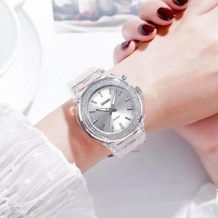 SKMEI Women's Transparent Waterproof LED Watch with Decorative Inlay on wrist, clear band, silver dial, quartz movement, 30m water resistance