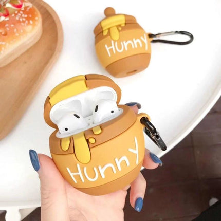 Protective Case for AirPods with Honey Pot Design for Daily Carry showing brown 'Hunny' silicone cover with keyring and AirPods inside