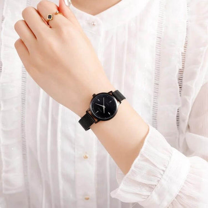 SKMEI Simple Fashion Watch for Women in Casual Everyday Style - black round dial on wrist, quartz movement, 30m splash resistant