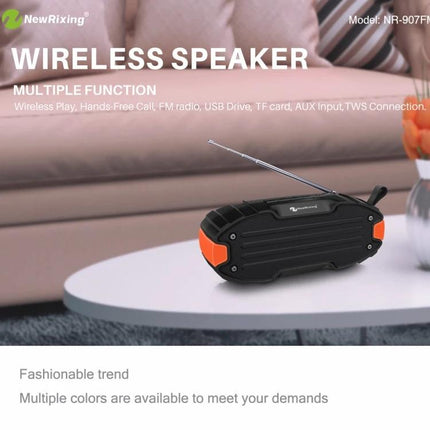 Rixing Compact Bluetooth Speaker For Commute And Home Use black portable speaker with FM antenna on coffee table