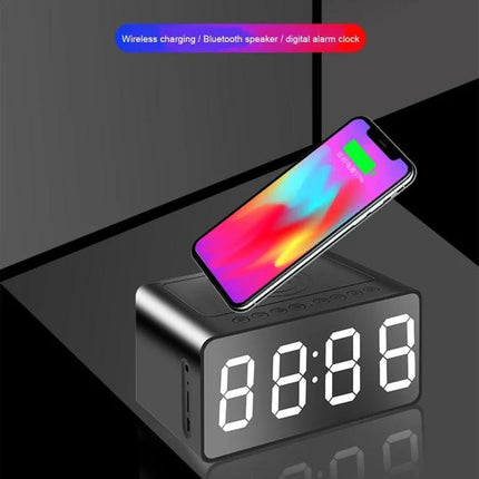 AEC Bluetooth Bedside Speaker Alarm Clock For Travel And Home showing LED clock, wireless charging pad and smartphone