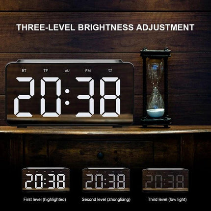 AEC Bluetooth Bedside Speaker Alarm Clock For Travel And Home showing large LED display with three brightness levels and hourglass