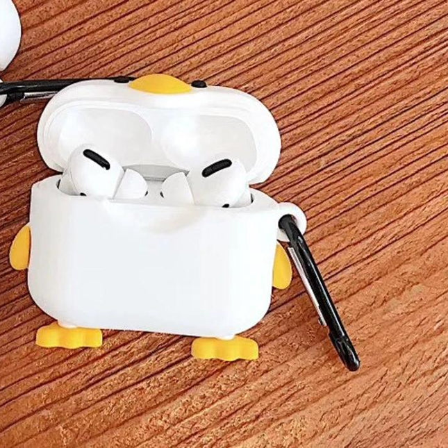 Protective Duck Case for Apple AirPods in Daily Commutes - cute white duck silicone case with carabiner protecting AirPods on wooden table