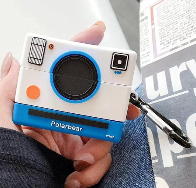 Camera-Style Case for Everyday AirPods Protection featuring dustproof camera-shaped white and blue protective case with carabiner