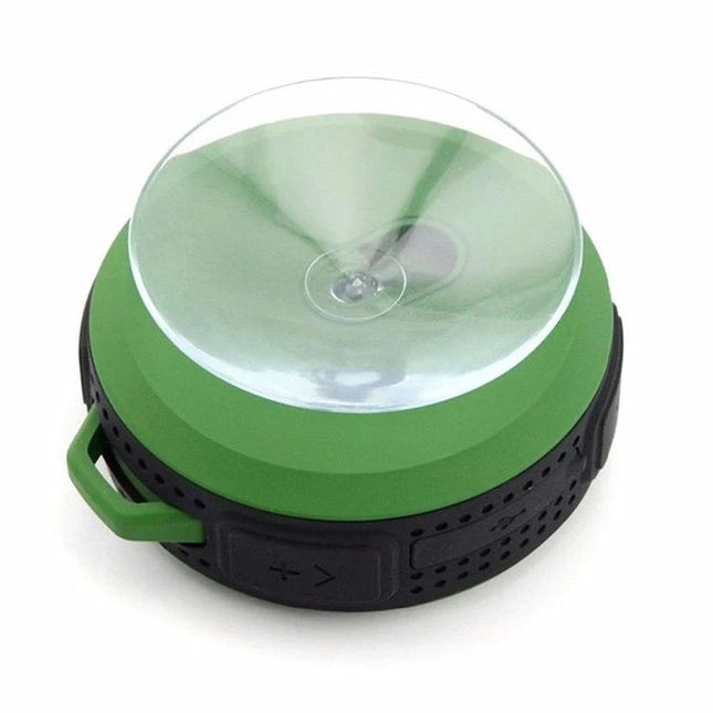 Compact Bluetooth Car Speaker With Clip For Commuting shown in green with suction cup, clip tab, controls, and splash-resistant design