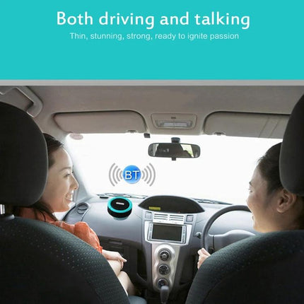 Compact Bluetooth Car Speaker With Clip For Commuting shown clipped on dashboard in car for hands free audio