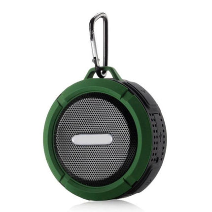 Compact Bluetooth Car Speaker With Clip For Commuting shown in green with carabiner, portable splash-resistant commuter speaker