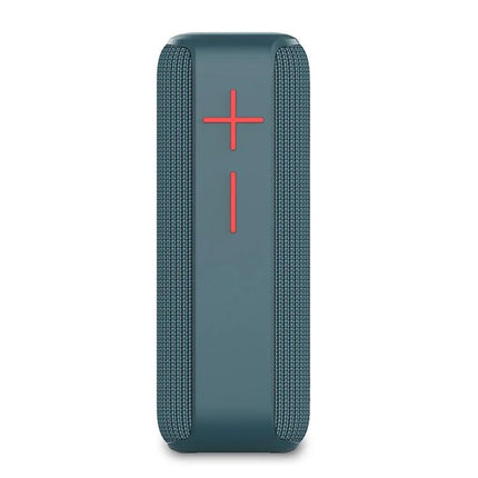 Portable Bluetooth Speaker With Carabiner For Outdoor Use clipped to backpack, teal speaker with red volume buttons