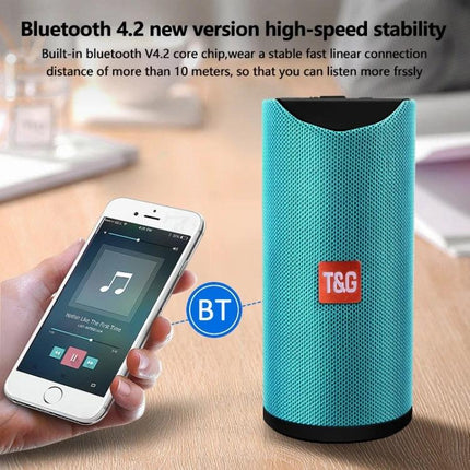 Portable Bluetooth Travel Speaker With FM Radio For Outdoor shown turquoise with phone Bluetooth 4.2 connection, USB, AUX, Micro SD support