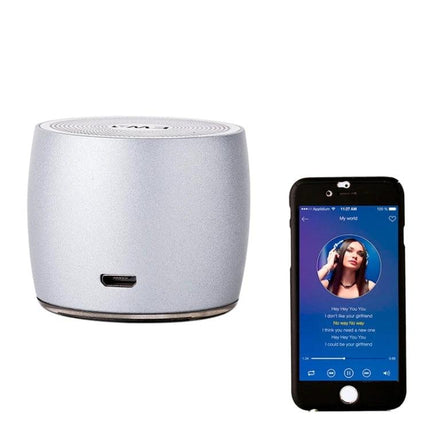 EWA Compact Bluetooth Speaker For Jogging And Travel small silver portable speaker beside smartphone for running and travel