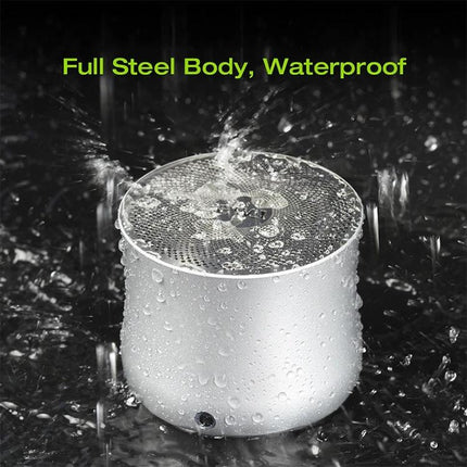 EWA Compact Bluetooth Speaker Outdoor Use Weather Resistant shown wet under rain, steel body, mesh cover, IPX6 protection