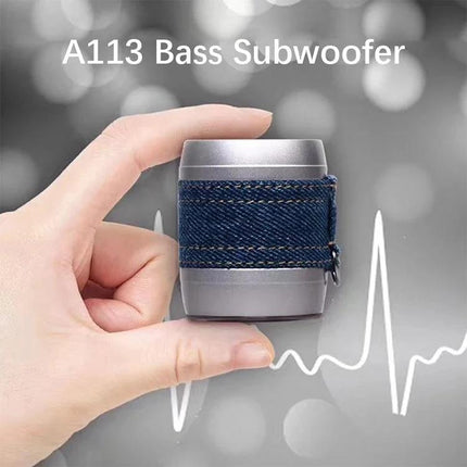 EWA Compact Portable Bluetooth Speaker For Pocket Use shown held between fingers with denim strap and bass subwoofer text