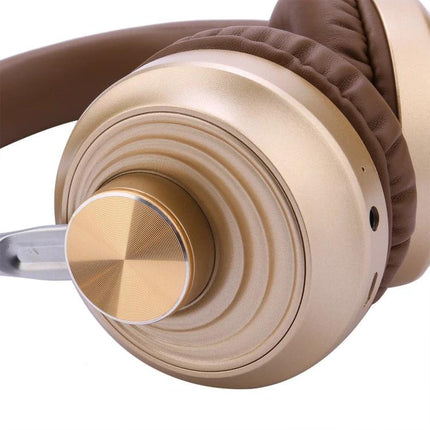 Wireless Headset For Commuting Music And Hands Free Calls gold folding over-ear headset with soft cushions and adjustable band
