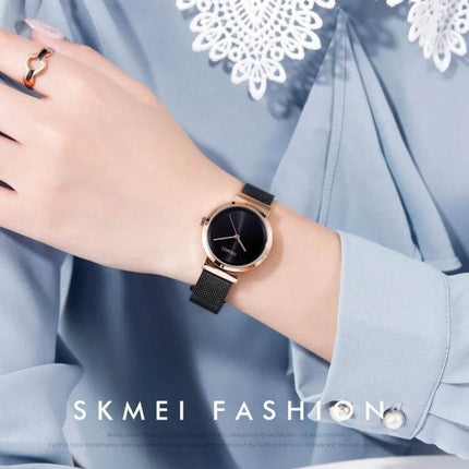 Skmei Waterproof Quartz Watch for Women and Daily Wear - sleek rose gold case, black mesh band, analog face for professional everyday use