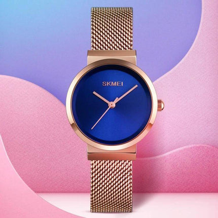 Skmei Waterproof Quartz Watch for Women and Daily Wear - rose gold mesh band with blue dial, 30m water resistant elegant office watch