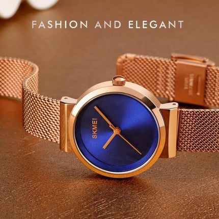 Skmei Waterproof Quartz Watch for Women and Daily Wear - blue dial rose gold mesh band, analog 30m water resistant elegant work watch