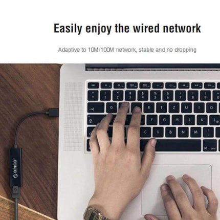 ORICO USB 2.0 to Ethernet Adapter for Wired Network Access plugged into laptop for stable wired internet