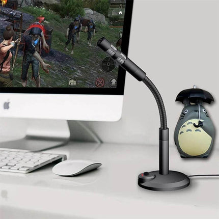 Portable USB Condenser Microphone for Computer and Gaming Use on desk with iMac, gaming screen, keyboard and mouse, gooseneck mic minimizing background noise