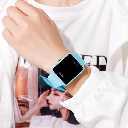 Skmei Waterproof Square LED Watch for Couples Daily Use - light blue square digital watch on wrist showing date/time, waterproof casual couple’s everyday watch