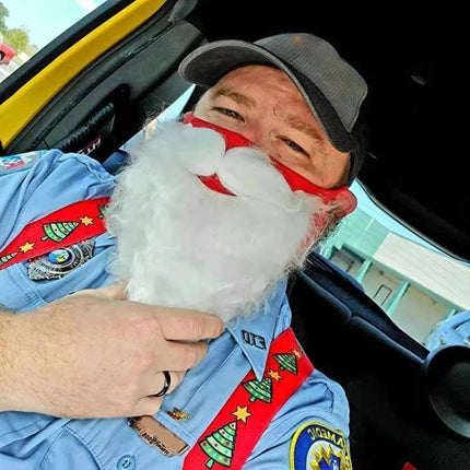 Santa Claus Beard Cotton Mask For Christmas Dress Up And Parties worn by man in car, lightweight cotton beard mask for holiday photos and parties