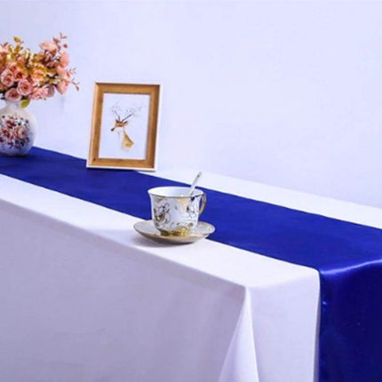 Satin Tablecloth 30x275 Cm For Weddings And Parties - navy blue satin runner on white banquet table with teacup and floral decor