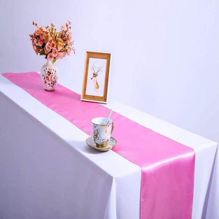 Satin Tablecloth 30x275 Cm For Weddings And Parties pink satin table runner on white banquet table with vase cup and frame
