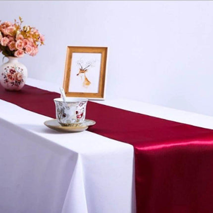 Satin Tablecloth 30x275 Cm For Weddings And Parties - burgundy satin runner on white banquet table with teacup and floral decor