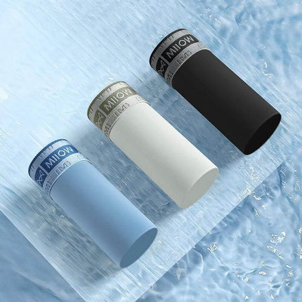 Seamless Ice Silk Men's Boxer Briefs For Everyday Comfort displayed in black, white and light blue with seamless ice-silk finish