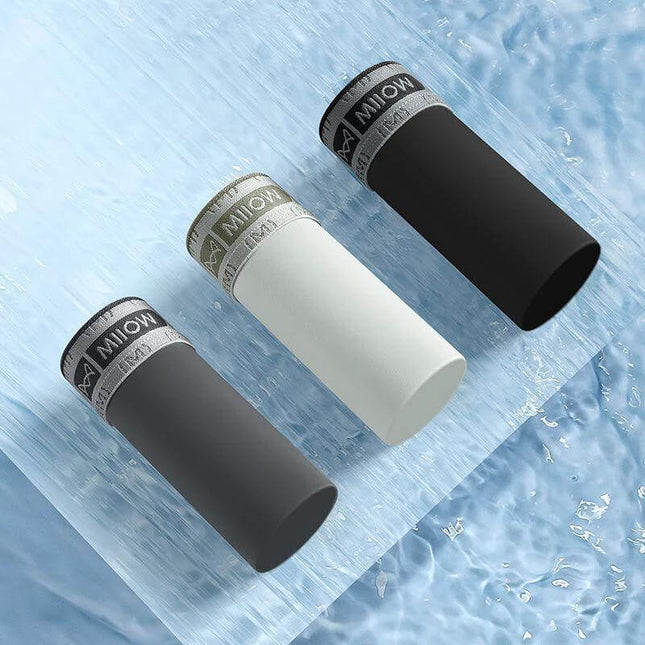 Seamless Ice Silk Men's Boxer Briefs For Everyday Comfort - three winter ice-silk nylon seamless boxer briefs in black, white, and gray