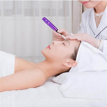 Semi-Permanent Tattoo Machine For Eyebrows, Everyday Makeup Tool - stainless steel electric eyebrow tattoo device in use on client