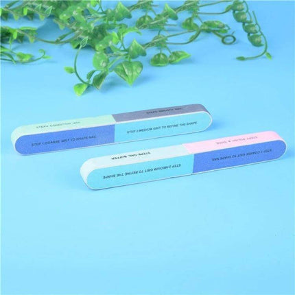 Seven-Sided Nail File Buffers For Fingernails And Toenails - pastel multi-grit seven-sided nail buffer set on blue background